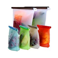 four different colored plastic bags with handles