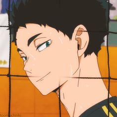 an anime character with black hair and green eyes looking at something behind a wire fence