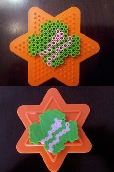 two pieces of lego art made to look like broccoli and an orange star