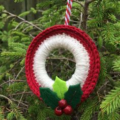 a christmas ornament hanging from a tree