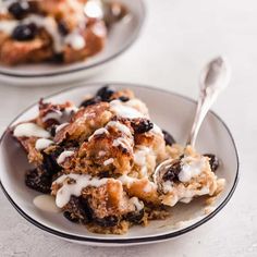 blueberry cobbler on a plate with a spoon