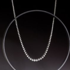 Ross-Simons - 1.50 ct. t. w. Bezel-Set Diamond Necklace in Sterling Silver. 20". Graduating from 1/8" to 3/16" wide, our 1.50 ct. t. w. round brilliant-cut diamond necklace is the ideal blend of demure and dazzling. Bezel-set in sterling silver, each round offers its own appeal - making it your go-to option for both on-duty and out-of-office. Figure 8 safety. Push-button clasp, diamond necklace. Diamond birthstones are the perfect gift for April birthdays. Timeless Sterling Silver Diamond Cut Tennis Necklace, Silver Single Strand Tennis Necklace, Sterling Silver Single Strand Tennis Necklace, Single Strand Diamond White Sterling Silver Necklace, Sterling Silver Single Strand Diamond Necklace, Sterling Silver Single Strand Necklace With Round Cut, Anniversary Sterling Silver Single Strand Tennis Necklace, Timeless Silver Solitaire Single Strand Necklace, Timeless Silver Solitaire Necklace Single Strand