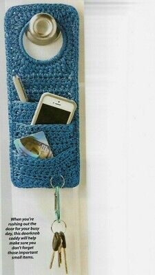 a cell phone and keys hanging from a hook