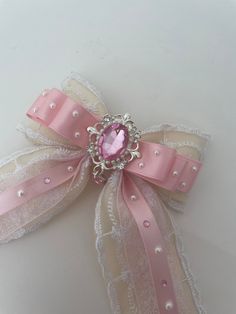 Extra touch for your lightstick! Ribbon is covered with white lace, three layer of pink ribbon, Victorian charm and elastic attachment with little bow.  Size is approximately length 6", wide 5 " It is compatible with variety of Kpop lightsticks. If you leave a note in the personalization section specifying which lightstick you plan to use, I can adjust the attachment accordingly. Please read :  The hourglass shaped lightstick such as Ateez ver2, Oneus ver2, may not stay on very top part. It is a Pink And White Accessories, Kpop Lightstick Bows, Lightstick Ribbon, Lightstick Bow, Lightstick Ideas, Kpop Lightsticks, Diy Hair Accessories Ribbon, Pink Victorian, Gift Bow