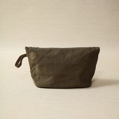 Cotton canvas pouch with bass zipper in bronze 32cm W x 13cm D x 18cm H Leather accent Brown Canvas Bag With Zipper Pouch, Circle Outline, Zippered Pouch, Bag Icon, Canvas Pouch, Zipper Pouch, Cotton Canvas, Bass, Pouch