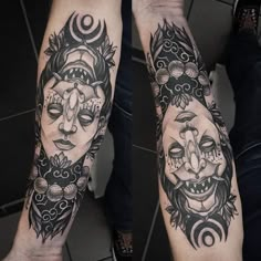 two people with tattoos on their arms, one is wearing a mask and the other has a face