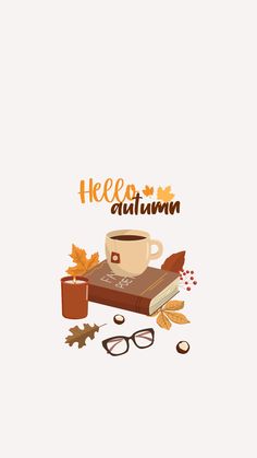 a cup of coffee sitting on top of an open book next to autumn leaves and glasses