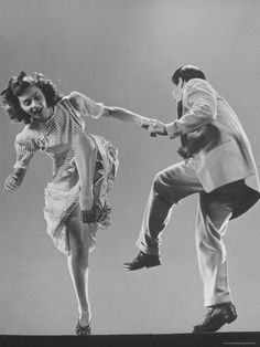 an old photo of two people dancing on top of a roof with the caption life magazine