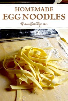 homemade egg noodle noodles on a cutting board with the title overlay reads, homemade egg noodles