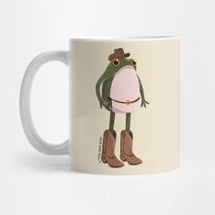 a coffee mug with a frog wearing boots and a hat on it's head