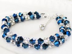 Bridal Bracelet Metallic Blue CZ Crystal Rhinestone Beach | Etsy Blue Crystal Bracelets For Wedding, Blue Round Beads Bracelet For Wedding, Blue Round Bead Bracelets For Weddings, Adjustable Sapphire Bracelets For Wedding, Adjustable Blue Crystal Bracelet For Wedding, Blue Faceted Beads Jewelry For Wedding, Blue Beaded Bracelets For Weddings, Adjustable Blue Beaded Bracelets For Wedding, Blue Bling Jewelry For Wedding