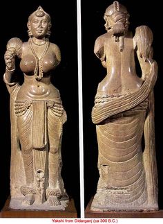 two statues of women with long hair