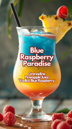 the blue raspberry paradise cocktail is garnished with fresh raspberries