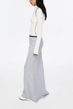 Unveil Laid-back Luxe with Textured Layers Elevate your wardrobe with this ribbed dual-waistband fleece lined mermaid skirt, a testament to comfort meets contemporary design. Crafted from high-weight fleece for a soft and snug feel, this piece boasts a ribbed upper waist that adds a textural dimension while the deliberately widened lower waistband exudes a casual, relaxed vibe. The mermaid tail with a rolled hem injects a carefree, chic look to this versatile piece, perfect for pairing with a sl Fitted Casual Maxi Skirt For Fall, Fitted Cotton Skirt For Loungewear, Fitted Maxi Skirt With Elastic Waistband For Fall, Lined Skirt For Loungewear, Stretch Long Skirt For Loungewear, Winter Casual Fitted Maxi Skirt, Fitted Casual Maxi Skirt For Winter, Fitted Fall Skirt, Low Waist Maxi Skirt