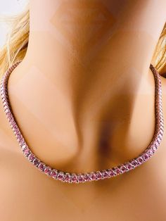 Introducing our Sparkly Pink Tennis Chain, a dazzling and vibrant accessory that transcends conventional jewelry. This exquisite piece is designed for both men and women who crave a touch of flamboyance in their style. The focal point of this tennis necklace is the VVS Fiery Pink Gemstones, which emulate the brilliance of genuine diamonds, creating a stunning and eye-catching display. Crafted with meticulous attention to detail, the simulated diamonds on this tennis chain rival the sparkle of re Pink Tennis, Tennis Chain, Diamond Chain, Tennis Necklace, Pink Gemstones, Exquisite Jewelry, Pink Diamond, Pink Sapphire, Gold Vermeil