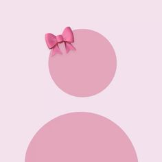 a pink background with two circles and a bow