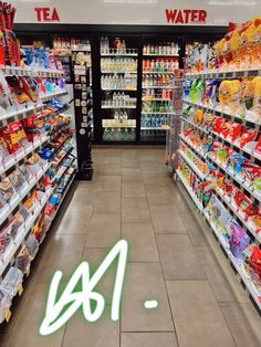 an aisle in a grocery store filled with lots of food and drink bottles on the shelves