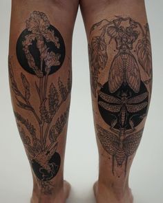 the legs are covered with tattoos and flowers