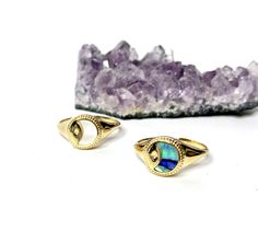 The Planets align with these beautiful signet rings with inlaid mother of pearl . Great for the star gazer in your life! This listing is only for one ring. These rings are only in one size which is a size 6 open back ring. Please see picture for details. Size 6 14kt gold plated ! ---------------------------------------- This item comes gift wrapped in signature BC wrapping and free gift. Also comes with a FREE GIFT!! Opal Eyes, Planet Ring, Saturn Necklace, Ring Moon, Star And Moon Necklace, Planet Necklace, Moon Ring, The Planets, Free Bracelet