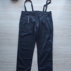 New Without Tag. Excellent New Condition. Pierre Darre Suspender Pants Pin Stripe Black Polyester Blend Men Sz.50 Made In Italy Actual Measurements: Approximately (Laying Flat). -Waist: 18.5 Inches -Hip: 23 Inches -Length: 43 Inches -Inseam: 32 Inches -Rise: 14 Inches Pt444 Suspender Pants, Pin Stripe, Dress Pants, Black Men, Mens Pants, In Italy, Man Shop, Black White, Italy