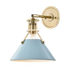 a light fixture with a blue shade on the side and a gold metal wall mount