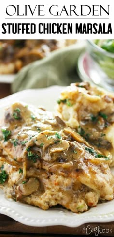 chicken masala with mushrooms and parsley on a white plate, next to a green salad