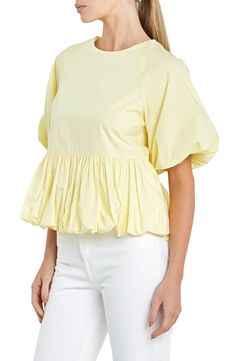 Delightful puff sleeves frame this charming peplum top crafted from crisp poplin. Jewel neck Short sleeves Cotton lining 100% cotton Hand wash, dry flat Imported Spring Cotton Blouse With Lantern Sleeves, Chic Cotton Puff Sleeve Top With Balloon Sleeves, Spring Puff Sleeve Top With Ruffle Hem, Chic Cotton Puff Sleeve Top, Chic Puff Sleeve Peplum Top For Brunch, Spring Cotton Puff Sleeve Top For Workwear, Yellow Puff Sleeve Top With Ruffles, Cotton Puff Sleeve Top With Blouson Sleeves For Summer, Spring Balloon Sleeve Cotton Blouse