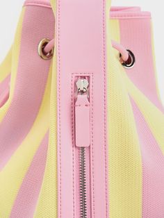 We have teamed up with Shanghai-based label Short Sentence to create a limited-edition collaborative capsule collection titled 'Riding On A Breezy Day'. Featuring colourful stripes, these eye-catching pieces are everyday essentials that are designed for urban utility. Big bags are back, and this limited-edition bucket bag in vibrant yellow-and-pink is certainly worthy of a spot in your wardrobe. Featuring an extra-large interior, this capacious carry-all is generously sized to hold your everyday essentials and more, yet it is still lightweight enough to be your go-to bag. Great for both daily commutes and vacations, this bag prioritises functionality -- it comes with a thick, shoulder strap that ensures carrying comfort for all-day use, while also being adjustable to best suit your prefere Platform Mary Janes, Size Chart For Kids, Charles Keith, Big Bags, Capsule Collection, Everyday Essentials, Belt Size, Shanghai, Bucket Bag