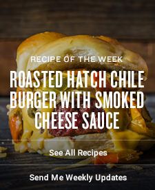 a grilled cheeseburger with smoked sausage is featured in the recipe of the week roasted hatch chili burger with smoked cheese sauce