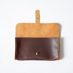 Details Made in America (in our Atlanta studio) 8.5 inches by 4.5 inches with a 1-inch gusset 100% full-grain leather, unlined Solid brass button stud Can be monogrammed The KMM & Co. clutch wallet comes in a wide variety of colors to match your favorite tote. It features four card slots, which can each hold multiple cards, and a divided interior to keep your phone and keys separate. The clutch wallet is the perfect piece to reach for whether you want to keep your essentials organized in you Brown Pouch Wallet With Interior Card Slots, Brown Wallet With Interior Card Slots, Classic Pouch Clutch With Card Slots, Classic Leather Envelope Coin Purse, Leather Envelope Coin Purse With Coin Pocket, Leather Envelope Coin Purse For Everyday, Envelope Wallet With Coin Pocket For Everyday Use, Everyday Envelope Wallet With Coin Pocket, Everyday Brown Clutch With Coin Pocket