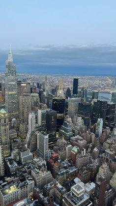 an aerial view of new york city with skyscrapers