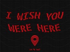 the words i wish you were here written in red on a black background with a pin marker