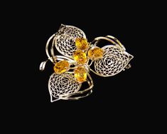 Thank you for visiting the SoChicFinds store - vintage and antique, costume and fine jewelry.  Ornate filigree leaves brooch with orange gemstone.  Gemstones: 5 doublets of citrine,   Metal: rhodium plated brass. Floral vintage jewelry. Citrine brooch has excellent condition. Original box. Japonese vintage Jevelry. 5 Citrine Filigree Leaves Brooch, Orange Gemstone Brooch Pin, Rhodium Plated  Vintage Floral Costume Jewelry Floral Costume, Gemstone Brooch, Floral Pins, Carved Shell, Sterling Silver Chain Necklace, Enamel Brooch, Silver Brooch, Floral Vintage, Opal Pendants