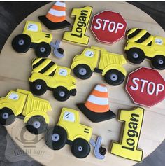 decorated cookies with construction vehicles and stop signs