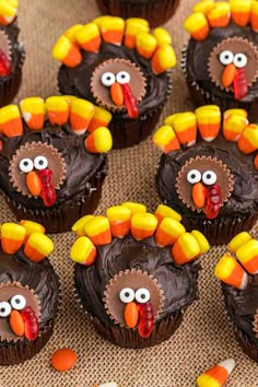 chocolate cupcakes decorated like turkeys with candy candies