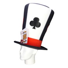 a white and black top hat with playing cards on it