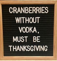 a sign that says cranberries without vodka must be thanksgiving written in white ink