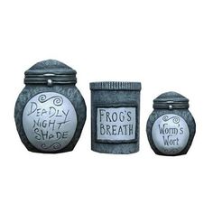 three jars with words written on them sitting next to each other