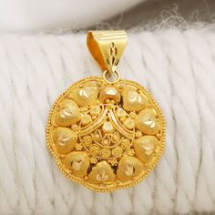 Please click -- Learn more about this item -- below for a full description 22k gold pendant handmade jewelry made in India weight is 3.1 grams approx. length is 3.2 centimeter approx. width is 2.4 centimeter approx. 22k Gold Locket Jewelry, Heavy 22k Gold Pendant Jewelry, 22k Gold Pendant Jewelry For Diwali, Yellow 22k Gold Round Pendant Jewelry, Spiritual 22k Gold Pendant Necklace, 22k Yellow Gold Flower Pendant Jewelry, Intricate 22k Yellow Gold Danglers, 22k Gold Spiritual Round Pendant, 22k Gold Chain