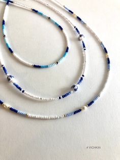 "Dainty Blue beaded necklaces with fresh water pearles and gorgeous porcelain beads in \"old money\" style.   Made with delicate high quality Czech glass seed beads. Get for yourself or gift to a friend. ♥   #vichkin #vichkindesign ↠ ABOUT    ▢  Size: about 15 inch, goes up to about 17 inch with chain extension.  ▢  Materials: 2mm / 3mm quality Czech glass seed beads  ▢  This item is handmade and may vary slightly from the picture, making every one completely unique.  ▢  Ready to ship. ↠ IMPORTANT The product is not suitable for young children. Please exercise child  Please check out my Jewelry Collection here: https://www.etsy.com/ca/shop/Vichkin?ref=seller-platform-mcnav§ion_id=22731346 Back to main page https://www.etsy.com/ca/shop/Vichkin All my items are handmade with love ♥  Natalie" Easy Necklace, Beaded Chocker, Crystal Bead Jewelry, Porcelain Beads, Coastal Granddaughter, Blue Beaded Necklace, Beaded Necklace Diy, Beads Bracelet Design, Blue Beach