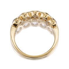 The Allure 1.60 band is an AB original design made right here in NYC! This ring features 6 Old Mine Cut diamonds that combine for approximately 1.60 carats and are half bezel-set in our signature 18kt yellow gold setting. The diamonds are approximately J-K-L in color, VS-SI in clarity. The ring is currently size 5.75 and can be resized! Why We Love It This sleek and chic finger-spanning band features chunky antique diamonds encased in a gold bezel, for the perfect blend of old meets new. Luxury Gold Diamond Ring With Bezel Setting, Timeless Yellow Gold Diamond Ring With Bezel Setting, Luxury Moissanite Ring With Bezel Setting, Yellow Gold Baguette Cut Diamond Ring With Bezel Setting, Luxury Bezel Set Diamond Ring For Anniversary, Luxury Diamond Ring With Bezel Setting For Anniversary, Yellow Gold Moissanite Diamond Ring With Bezel Setting, Bezel-set Baguette Cut Diamond Ring, Baguette Cut Diamond Ring With Bezel Setting