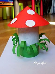 a mushroom house made out of construction paper