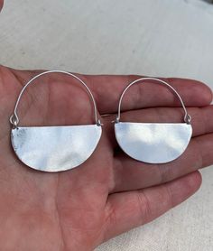 "These are stunning and fabulous boho hoop earrings! They are simple in design while also being effortlessly stylish. The earrings are timeless and versatile. Perfect for everyday wear. The earrings measure 1 3/4\" long by 1 1/2\" wide. Made from allergy free plated silver. Thanks for stopping by! Please take a moment and visit the rest of my Etsy shop. I have many more unique jewelry designs to choose from! 🌸 Tiger Flower Jewelry 🌸 🌸 Inspired by Nature 🌸" Minimalist Crescent Hoop Earrings For Everyday, Minimalist Small Hoop Metal Earrings, Minimalist Small Hoop Earrings In Metal, Minimalist Small Hoop Clip-on Earrings, Minimalist Small Metal Hoop Earrings, Handmade Minimalist Small Hoop Earrings, Nickel-free Crescent Hoop Earrings For Everyday, Everyday Crescent Hoop Earrings Nickel Free, Minimalist Metal Hoop Earrings For Everyday