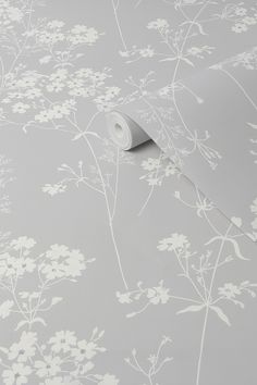 an image of a wallpaper with flowers and leaves on it's surface in grey