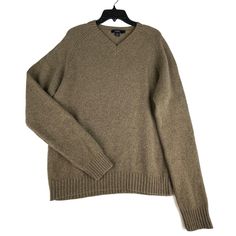 J. CREW Men's Knit Wool V-Neck Sweater 100% lambswool V-neck Measurements: (All measurements are approximate and may vary slightly from the listed information) Armpit to armpit 24" Shoulder + sleeve length 36" Front length 27" (taken from base of neck to hem) To ensure a perfect fit, please compare the measurements above to an item you already own that fits you well Classic Brown V-neck Sweater For Fall, Classic Knitted V-neck Sweater For Fall, Casual Long Sleeve Lambswool Sweater, Classic Knit V-neck Sweater For Winter, Classic Brown Crew Neck Polo Sweater, Classic Brown Polo Sweater With Crew Neck, Classic Knitted V-neck Sweater For Winter, Casual Wool V-neck Sweater For Winter, Casual Wool Polo Sweater With V-neck