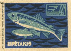 a stamp with a fish on it that says uptaki's in blue and green