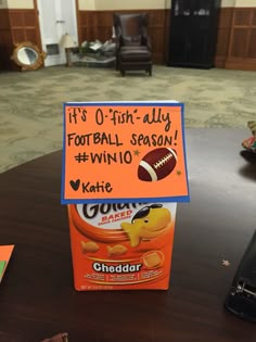 a sign on a table that says it's 0 - first - ally football season