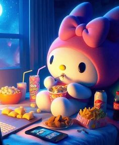 a hello kitty sitting at a table with food and drinks