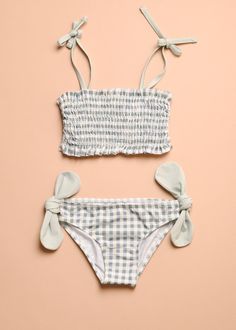 Gingham checked vintage-inspired bikini. Ruched top is fully lined for comfort and has a faux-tie strap so it will never come undone. Bottom has 2 bow details sewn on for a great aesthetic look. Preppy Swim, Cruise Swimsuit, Kids Closets, Animal Clothes, Swimsuit Inspiration, Green Quotes, Baby Swimsuit, Preppy Clothes, Come Undone