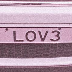 the back end of a car that says love 3